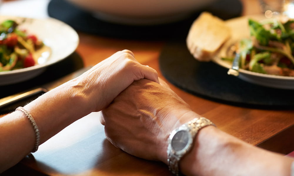 The Exodus Experience - Couple Praying For Meal - Landscape(Small)